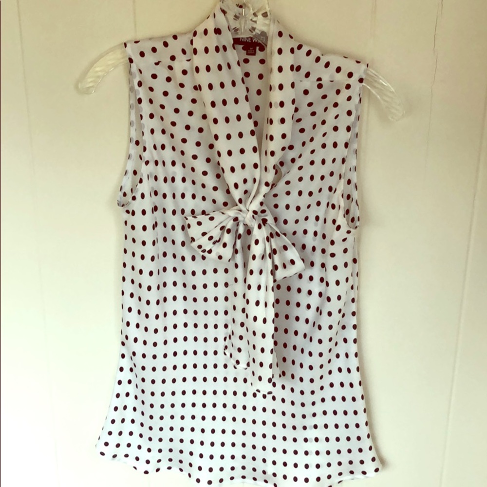 Black and white polka dot blouse